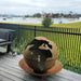 Fire Pit: World Globe on a deck overlooking a lake