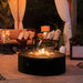 Galio Star Fireplace | front view of black fireplace showing star flame pattern