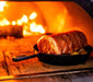 Flaming Coals: Wood Fired Pizza Oven cooking meat